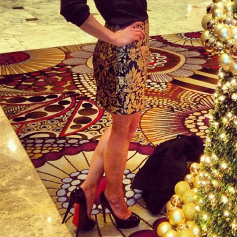 Gold and black embroidered mini skirt